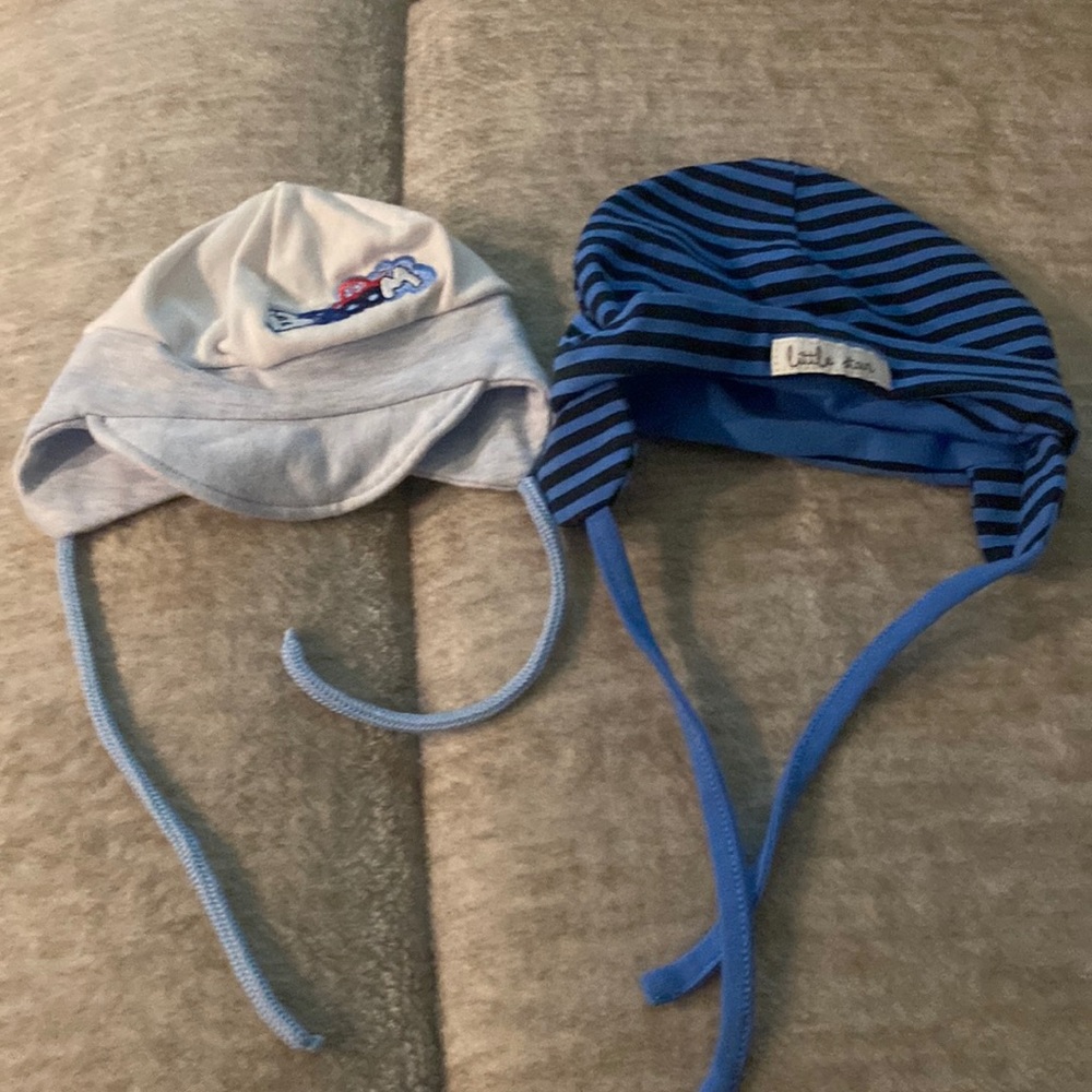 Baby hats . Blue and white
